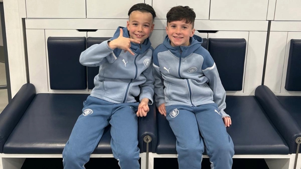 Best friends Noah Greenwood and Jasper Cooney show off their new City tracksuits after signing for the Premier League champions