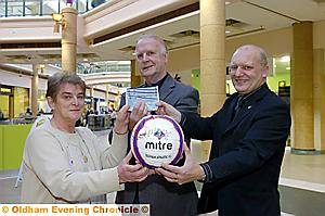 RESULT! Ann and Frank Winterbottom collect the VIP tickets from shopping centre manager Mike Flanagan RESULT! Ann and Frank Winterbottom collect the VIP tickets from shopping centre manager Mike Flanagan