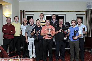 REPRESENTATIVES of the successful teams show off the Oldham and District Golf League silverware. REPRESENTATIVES of the successful teams show off the Oldham and District Golf League silverware.