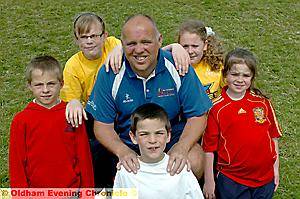 MARK HOLMES (centre)pictured with (clockwise from front centre) Adam Woodall, Owen Woodall, Kirsty Lyons, Emma Wheeler and Robyn Bower MARK HOLMES (centre)pictured with (clockwise from front centre) Adam Woodall, Owen Woodall, Kirsty Lyons, Emma Wheeler and Robyn Bower