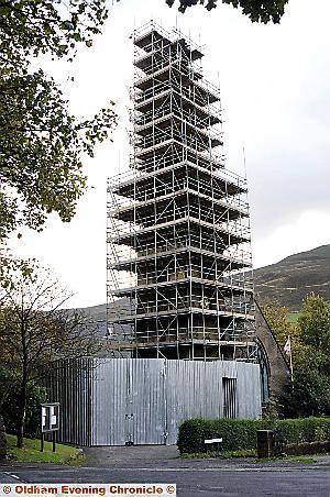 Looking every inch like a giant pagoda, the spire of St Mary’s, Greenfield, towers over the valley 