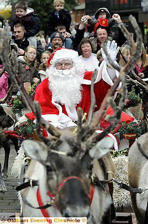 A WAVE from Father Christmas on his reindeer-drawn sleigh 
