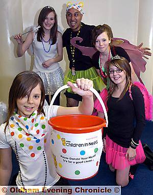 STAFF and pupils at Hathershaw Technical College ditched their uniforms for tutus, wings and tiaras for Children in Need. Pictured, from left, are, Aimee Payne, Shannon Allen-Barfoot, intervention manager Anjum Raza, Alison Padula and Lauren Fricker-Harrison. 