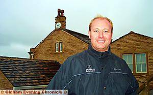 IAN Dronsfield outside his Manor House clock IAN Dronsfield outside his Manor House clock