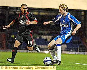 CHRIS Taylor takes on the Walsall defence. 