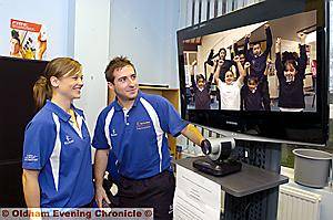 Laura Heslop and Steve Ferriss help to wake up Oldham schoolchildren with a 15 minute aerobics session via video conferencing. with Kids from Freehold School. Laura Heslop and Steve Ferriss help to wake up Oldham schoolchildren with a 15 minute aerobics session via video conferencing. with Kids from Freehold School.
