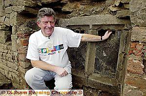 DOUG at the site of a Sixteenth century window which was unearthed during one of the three hugely successful excavations of Royton Hall DOUG at the site of a Sixteenth century window which was unearthed during one of the three hugely successful excavations of Royton Hall