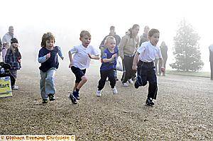 CATCH ME IF YOU CAN: The boys (left) show plenty of determination as they head out into the mist.