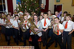 THE Rushcroft musicians are pictured with Councillor Hazel Gloster, chairman of Shaw and Crompton Parish Council THE Rushcroft musicians are pictured with Councillor Hazel Gloster, chairman of Shaw and Crompton Parish Council