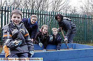 BLOOMING marvellous . . . Children from Hodge Clough junior school get planting with the help of Groundwork Oldham and Rochdale and BPP Law school in Manchester — pictured, from left, are George Crawford, Gemma Russell (Groundwork), Emma Russell, Joshua Smith and Joyce Ebiagbe (BPP law school) BLOOMING marvellous . . . Children from Hodge Clough junior school get planting with the help of Groundwork Oldham and Rochdale and BPP Law school in Manchester — pictured, from left, are George Crawford, Gemma Russell (Groundwork), Emma Russell, Joshua Smith and Joyce Ebiagbe (BPP law school)