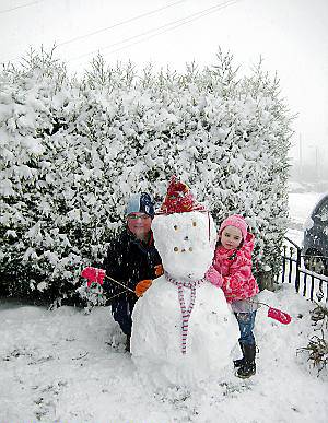 READER'S PICTURE: The German youngsters and their snowman in Arncliffe Rise Moorside