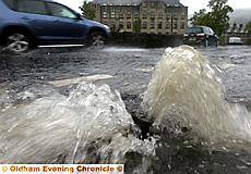 Church Road, Uppermil: drains overflowing 