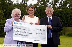 GREAT start . . . Dr Kershaw’s Hospice appeals manager Brian Hurst accepts a cheque to kickstart the appeal from Winn Cameron (far left), chairman of HealthSure trustees; and Jackie Conboy, administration manager 