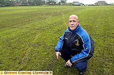 Carl Worrall inspects the mess 