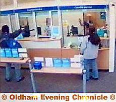 CCTV stills of armed robbery at Barclays Bank in Shaw CCTV stills of armed robbery at Barclays Bank in Shaw