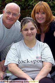 Donna Moore (centre) with her former foster carers Barry and Yvonne Cossins Donna Moore (centre) with her former foster carers Barry and Yvonne Cossins