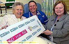 PATIENT Anne Kuhnert launches the 60 for 60 appeal on G2 ward at the Royal Oldham Hospital with Staff Nurse Debbie Howe, and fund-raising manager Jan Bolton 