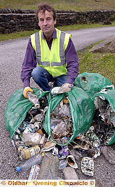 Chris Davies with the litter he collected along the A635 Isle of Skye road 