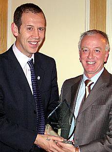 Pete receives the award from Trevor Massey Pete receives the award from Trevor Massey