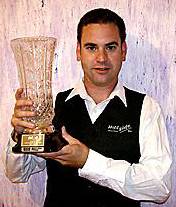 MARK POLLITT shows off the trophy. MARK POLLITT shows off the trophy.