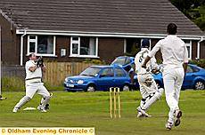 Hollinwood’s Mohammed Kamran has Shaw skipper Rick Harrington caught behind by John McGovern Hollinwood’s Mohammed Kamran has Shaw skipper Rick Harrington caught behind by John McGovern