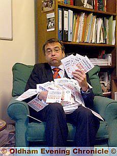 INUNDATED . . . Phil Woolas with some of the cards that filled his postbag INUNDATED . . . Phil Woolas with some of the cards that filled his postbag