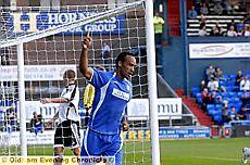 THAT’LL DO NICELY: Chris O’Grady celebrates after slotting in Athletic’s equaliser. 
