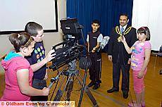 Some tricky questions for the Mayor, Councillor Shoab Akhtar, from interviewer Alice Eckersley, from Crompton House School, aided by above, (from the left) Millie Comer, from St John Bosco School, Blackley, Jack Comer, from Radclyffe School, and Zain Noon, from Broadfield School 