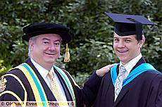 Professor Bob Cryan, vice-chancellor of Huddersfield University, with Duncan Owen (21) 