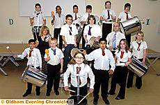 DRUMMING up success . . . Pupils at St Augustine’s practice the sounds of the samba DRUMMING up success . . . Pupils at St Augustine’s practice the sounds of the samba