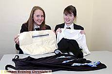 RECYCLED fashion . . . Fiona Bushell (left) and Madeline Edge with some of their garments 