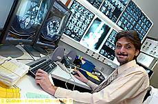 DR KUMAR with the X-ray system at the Royal Oldham Hospital 