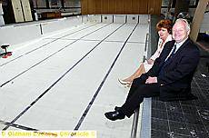 KEEPING their feet dry . . . Councillor Brian Lord, lead member for adult services and health; and Veronica Jackson, executive director for adult and community services 