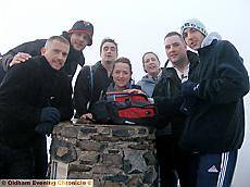 WE’VE done it . . . (from the left) Dan, Alex, Jonathan, Vicky, Andrea, Chris and Neil at the top of Snowdon to complete the challenge WE’VE done it . . . (from the left) Dan, Alex, Jonathan, Vicky, Andrea, Chris and Neil at the top of Snowdon to complete the challenge