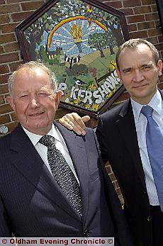 Dr Moore (left) with successor Dr Paul Cook Dr Moore (left) with successor Dr Paul Cook