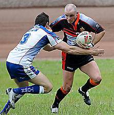 HANDS OFF: Daryl Cardiss (right) pushes Mark McCully away