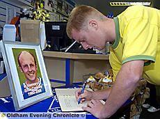 ATHLETIC have opened a book of condolence at Boundary Park for former player Ernie Cooksey, who last week lost his battle against cancer. Stephen Roberts, of the Football in the Community programme, is one of many to have already signed. ATHLETIC have opened a book of condolence at Boundary Park for former player Ernie Cooksey, who last week lost his battle against cancer. Stephen Roberts, of the Football in the Community programme, is one of many to have already signed.