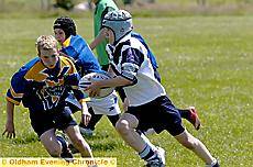 Adam Howard (Counthill, left) and Dom Elkin (Saddleworth) in action. 