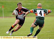 COMING AT YOU: CHRIS Baines (left) runs towards Dean Cook in Oldham’s 66-10 win at Hunslet. COMING AT YOU: CHRIS Baines (left) runs towards Dean Cook in Oldham’s 66-10 win at Hunslet.