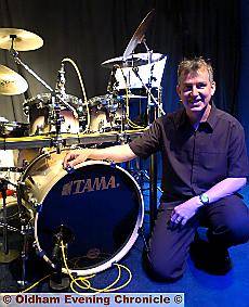 FOLLOWING the beat of a different career . . . drummer Gavin Perry FOLLOWING the beat of a different career . . . drummer Gavin Perry