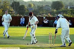 WOODHOUSES’ Chris Reeve heads for the pavilion after being bowled by Grange’s Joe Hughes. WOODHOUSES’ Chris Reeve heads for the pavilion after being bowled by Grange’s Joe Hughes.