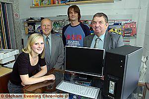 WELL DONE . . . Emma and her prize computer, with (from left) Ray Coverley, past president of the Rotary Club of Oldham, Neil George of Bits and Bytes, who supplied the computer and Jim Stott of Warburtons, who sponsored the prize WELL DONE . . . Emma and her prize computer, with (from left) Ray Coverley, past president of the Rotary Club of Oldham, Neil George of Bits and Bytes, who supplied the computer and Jim Stott of Warburtons, who sponsored the prize