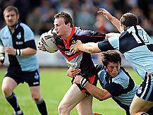 GET OFF ME: Paul O’Connor tries to break clear with two York City Knights players paying close attention. 
