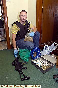 PC Steve Pickering with the imitation firearm 

