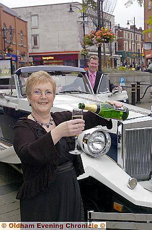 Carole England gets the champagne treatment. 