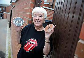 DISC will do nicely . . . May Boydell and her new gate made out of plastic CD covers
DISC will do nicely . . . May Boydell and her new gate made out of plastic CD covers