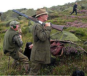 SABOTAGE . . . shooters look on as members of the NWHSA attempt to stop the grouse hunt 