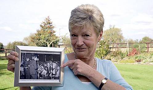 Gillian Gill with Beatles photo from 1963 Astoria gig. Gillian Gill with Beatles photo from 1963 Astoria gig.