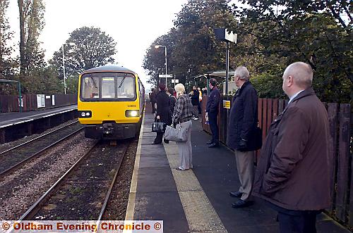 BUSIER than ever . . . Mills Hill station which was promised extra car parking spaces BUSIER than ever . . . Mills Hill station which was promised extra car parking spaces