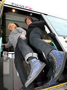 ECO friendly fashion . . . First employees Leigh-Anne Weathers (left) and Nicola James try out their new trainers ECO friendly fashion . . . First employees Leigh-Anne Weathers (left) and Nicola James try out their new trainers